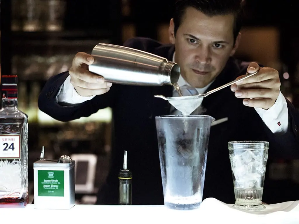 markus raidl mixing drink at kempinski